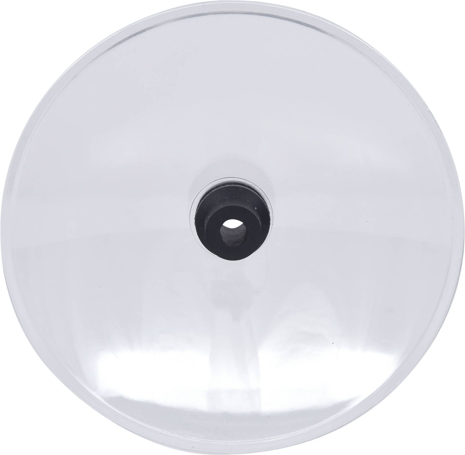 A round, transparent glass plate with a black centre.