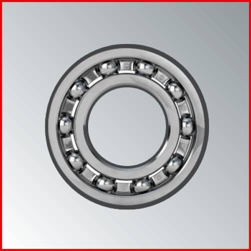 A ball bearing with steel balls in a metal ring, against a grey background. Essential for smooth mechanical movement.