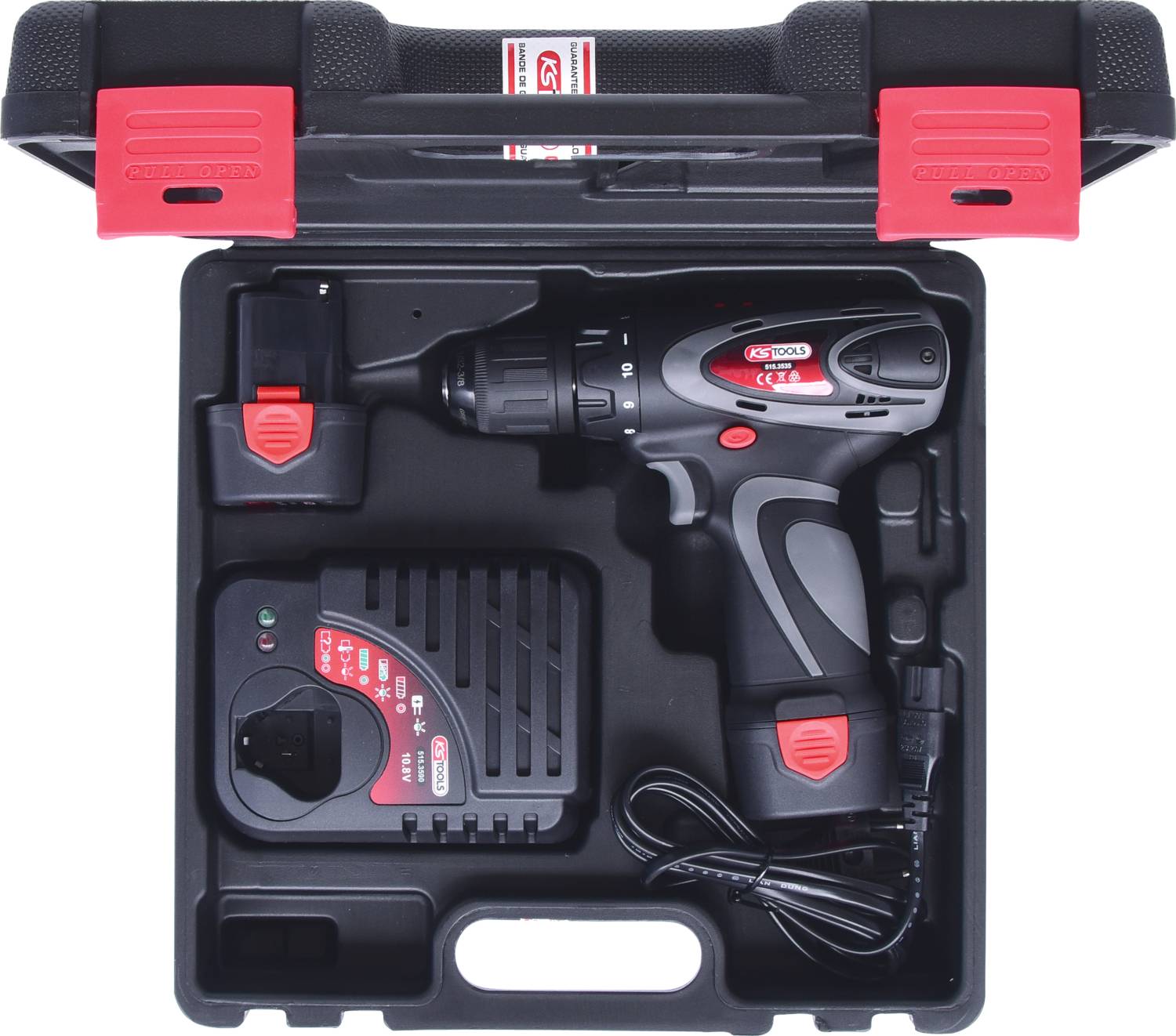 Cordless drill in a black plastic case with charger and spare battery.