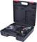 Open black tool case with cordless drill and charger, both nestled in precisely fitted foam insert.