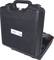 Black tool case, slightly open, with padded handle and security locks, revealing charger inside.