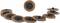 Ten grinding discs made of brown material with a black core, arranged in a circular formation. One disc stands upright in the centre.