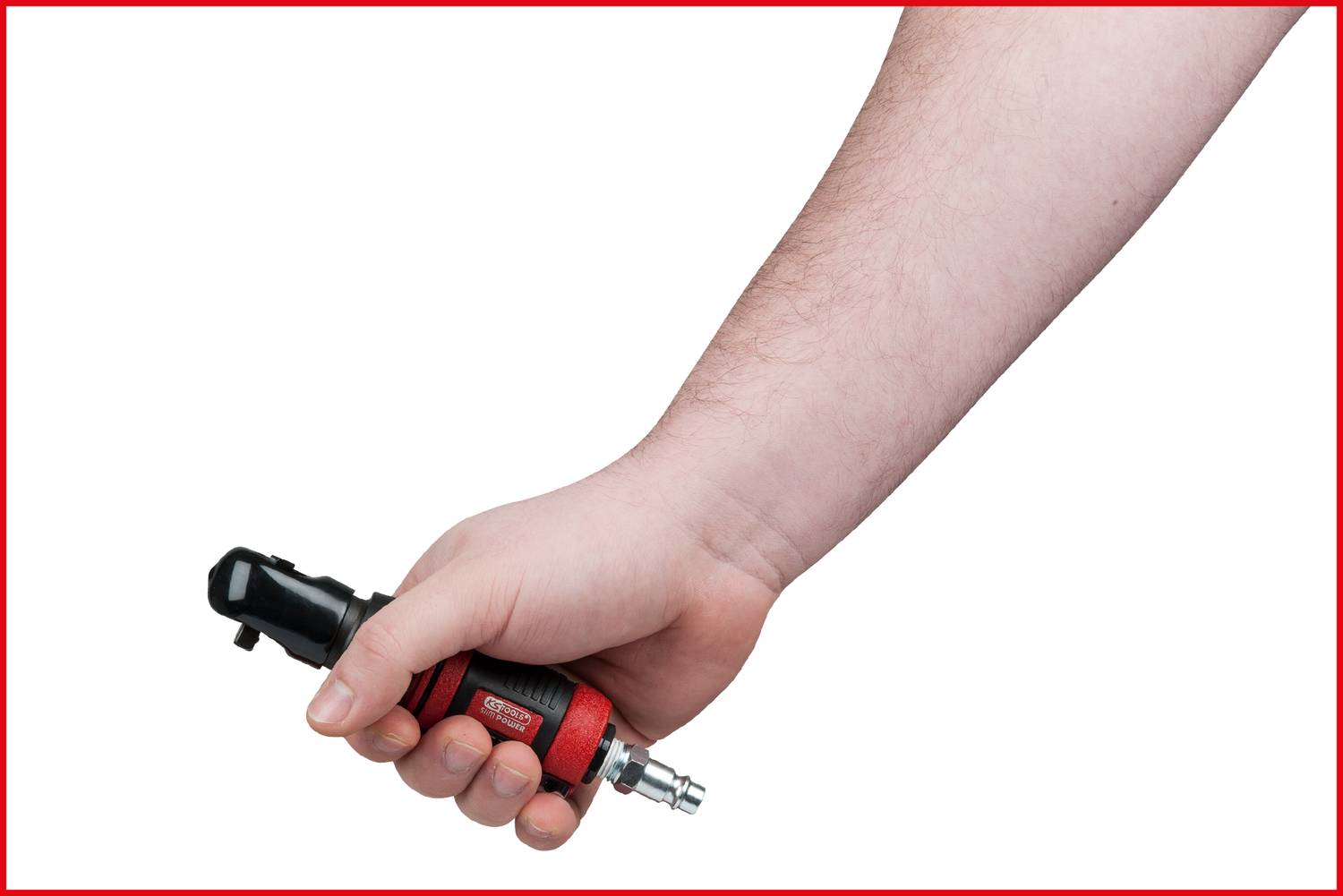 A hand is holding a black and red pneumatic screwdriver against a white background.