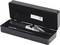 Hand refractometer in an open black box with pipette, for measuring liquid densities, indicated by scale on the lens.