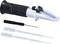 'Refractometer with pipettes and screwdriver, used for measuring sugar or salt concentration in liquids.'