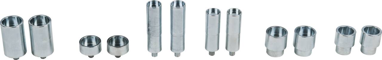 A set of various socket attachments in different sizes, made of metal, arranged on a white surface.