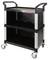A black, two-tier tool trolley with handles and four wheels. 'KS Tools' brand visible on the upper shelf.