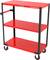 A red workshop trolley with three levels and black metal frames. It has four wheels and a black handle for pushing.