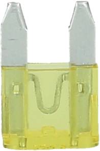 Yellow flat fuse with two metallic contacts, used to protect electrical circuits in vehicles and devices.