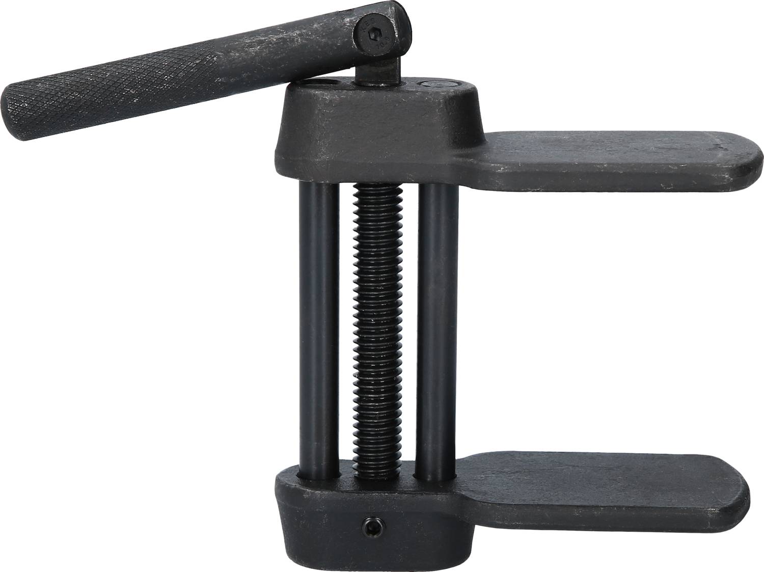 A black vice with a handle. It consists of two flat, parallel metal parts connected by a screw.