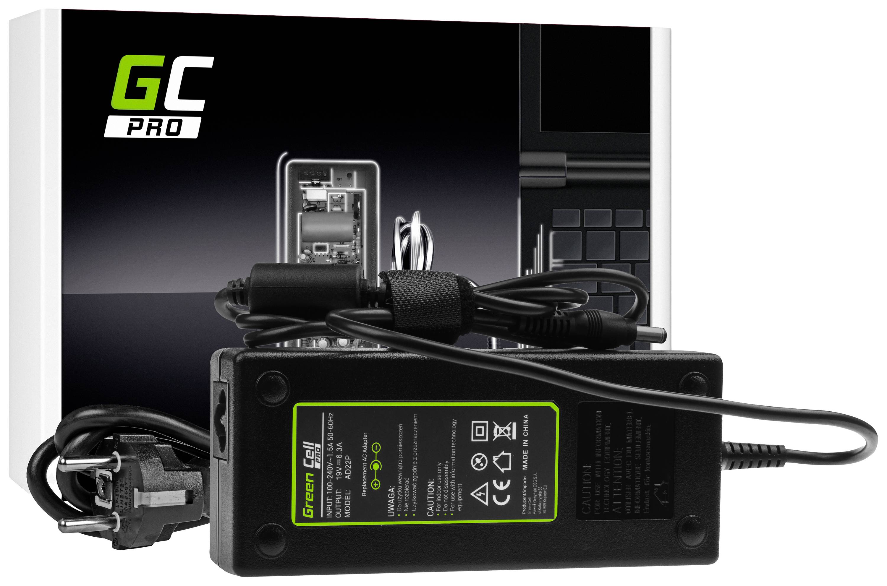 Charger with cables in front of a GC PRO brand packaging, suitable for laptops. Packaging shows laptop illustration in the background.