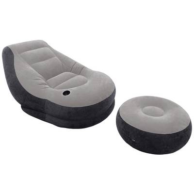 Grey, inflatable armchair with a round footrest, perfect for relaxed seating in indoor spaces.