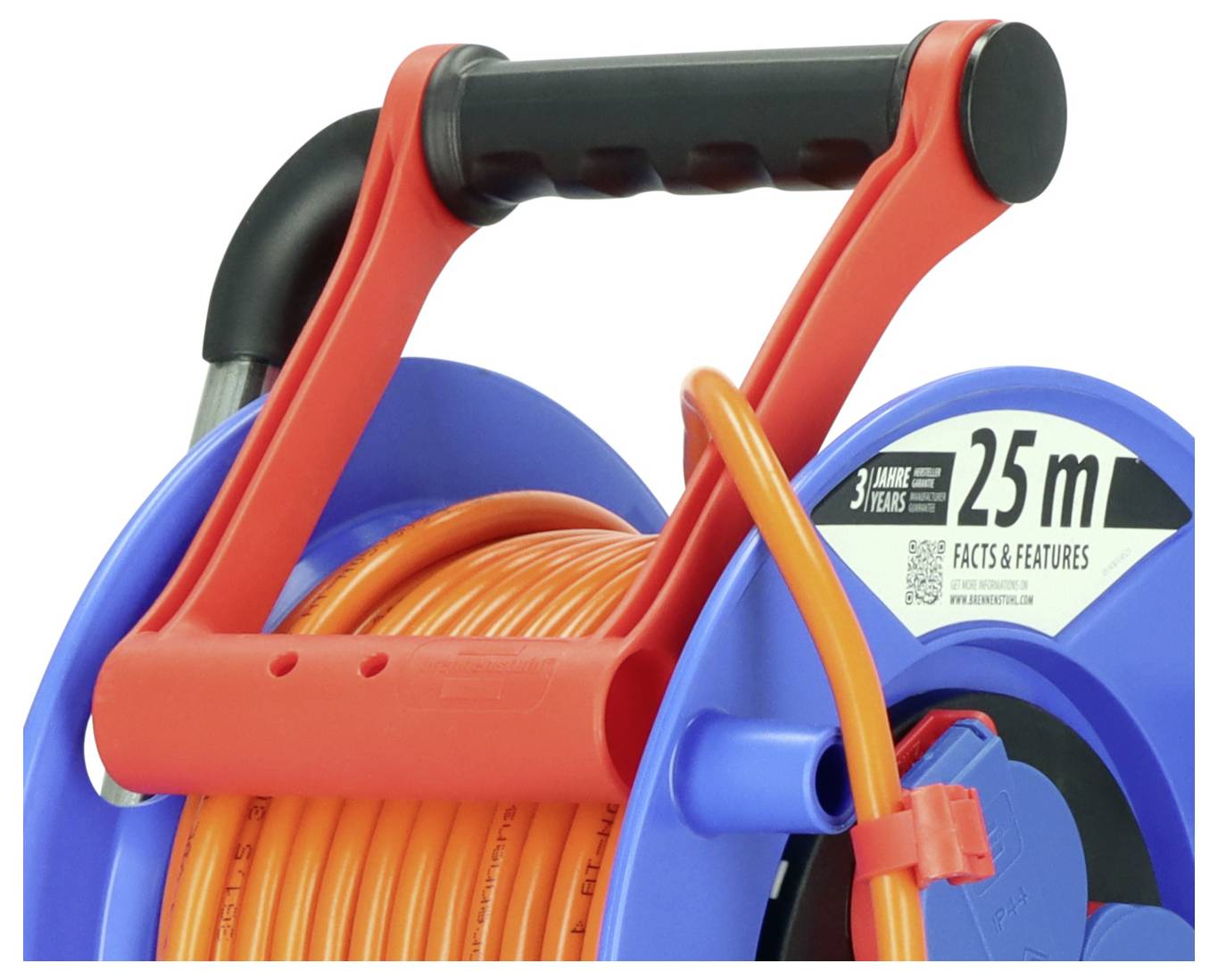 Close-up of a 25 m orange garden hose on a blue reel with a red handle and black grip.
