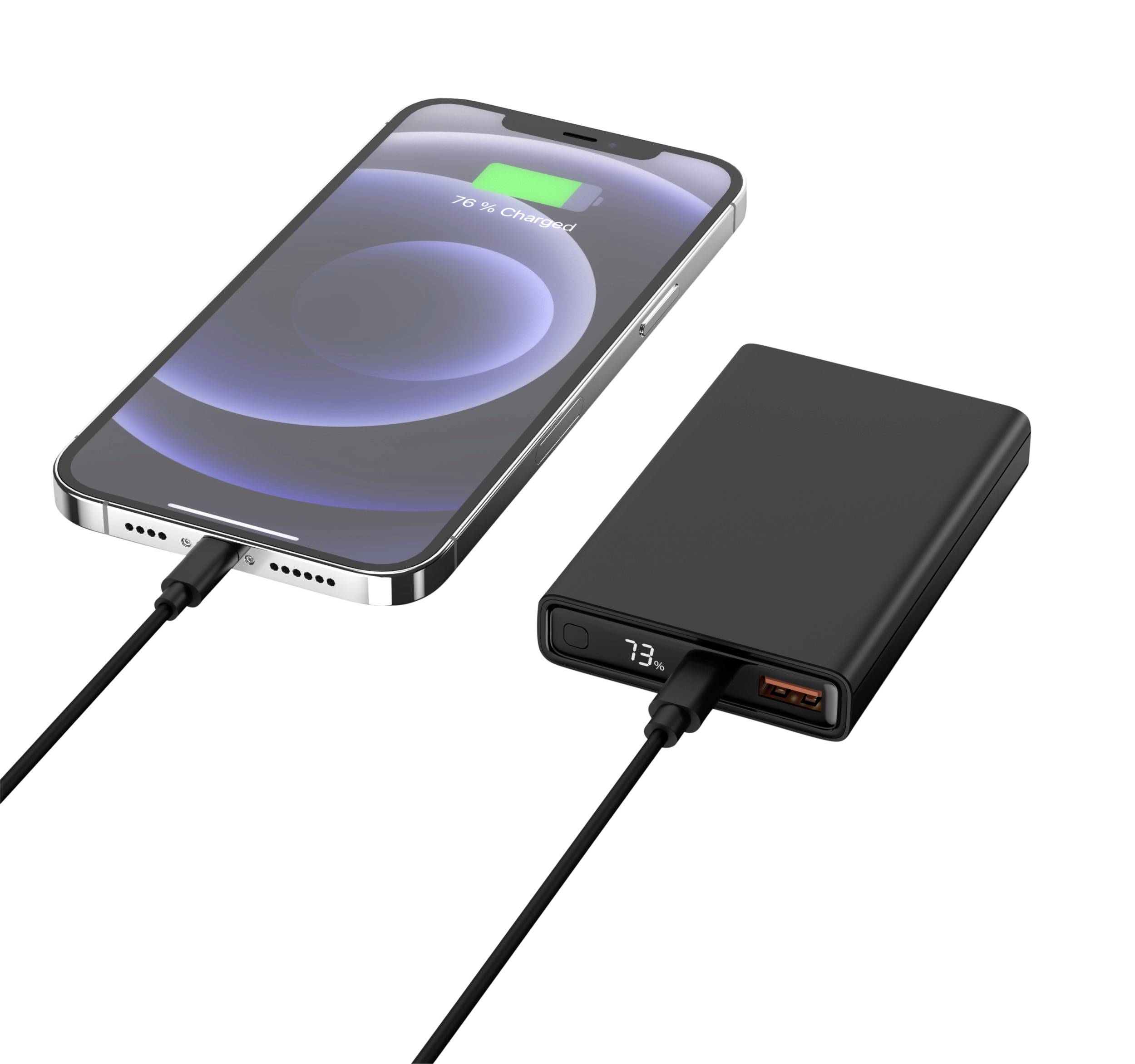 A smartphone is being charged from a power bank via a cable. The power bank displays a remaining charge of 73%.