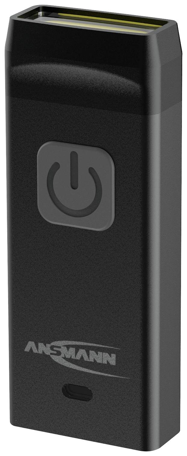 A portable, black charger with a power on/off symbol on the front. The device is labelled 'ANSMANN'.