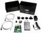 A Raspberry Pi starter kit with a Raspberry Pi, power adapter, cables, case, and small accessories.