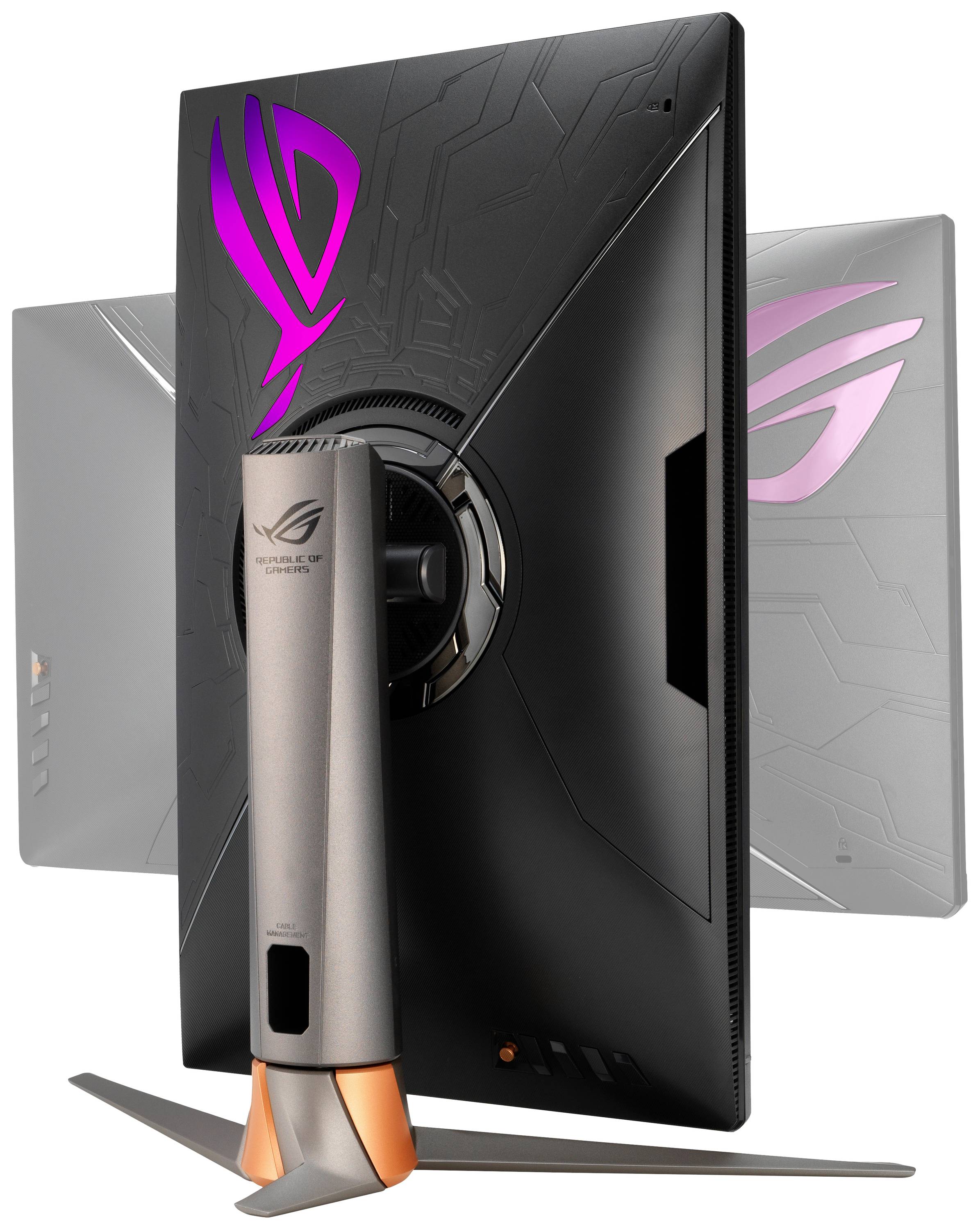 Back of a gaming monitor with illuminated logo and futuristic design. The stand has orange accents.