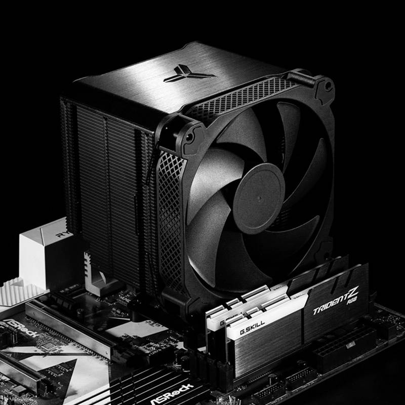 A large CPU cooler with a fan is mounted on a motherboard, surrounded by RAM modules and other computer components.