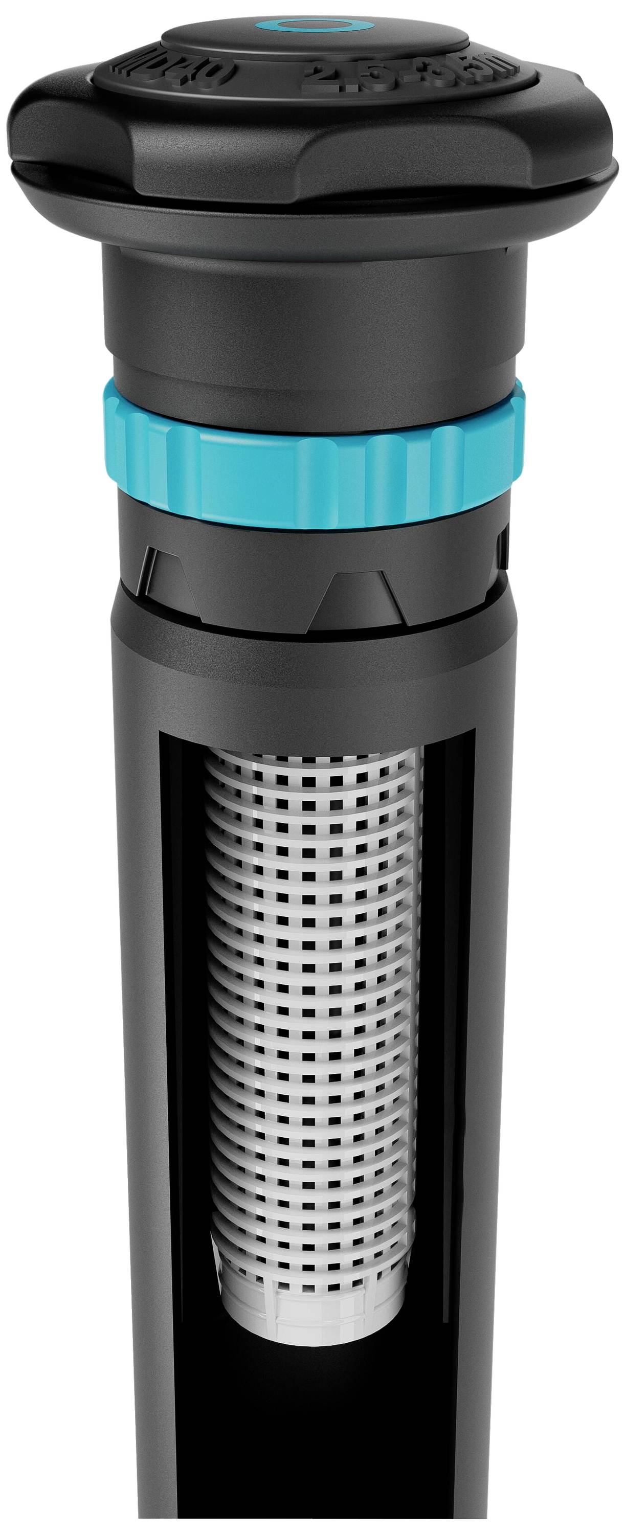 Close-up of a black sprinkler head with a blue ring and integrated filter element, used for water distribution.