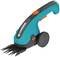 Electric hedge trimmer in blue with a black handle and orange buttons. 'GARDENA' brand name visible.