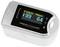 Pulse oximeter with digital display shows oxygen saturation of 99% and pulse rate of 64 beats per minute.