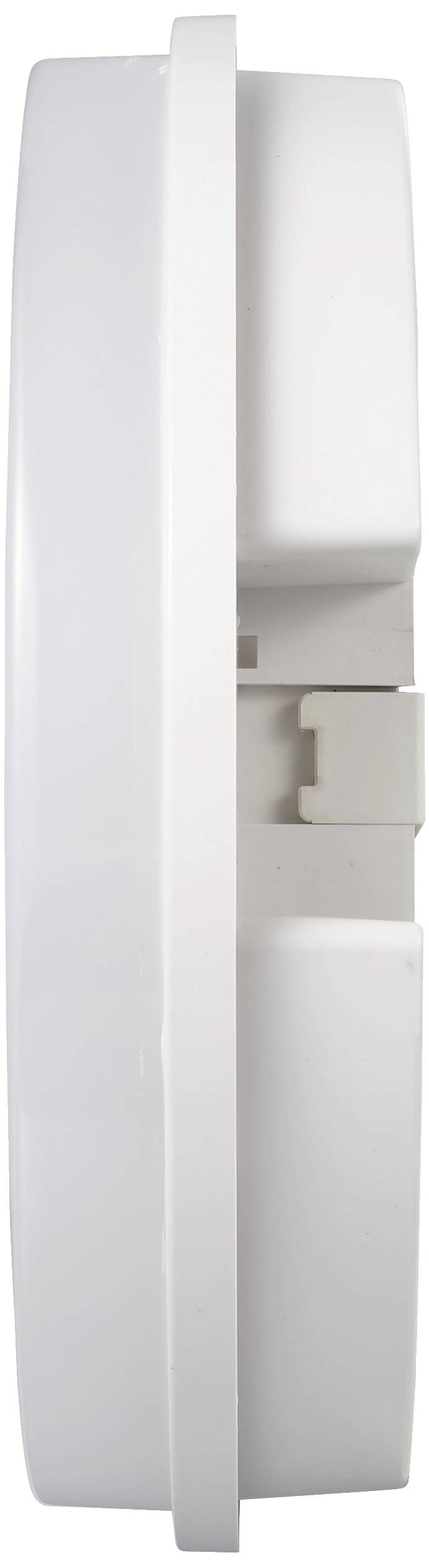 Side view of a white, circular smoke detector with wall mounting bracket.