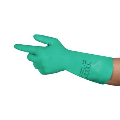 Green rubber glove on a hand, with fingers slightly extended to the left, suitable for medical or industrial applications.
