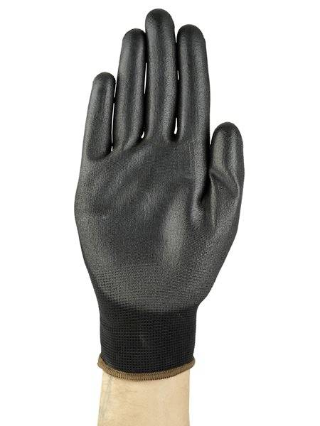 Black work glove on a hand, palm facing forward, protective equipment for industrial or manual tasks.