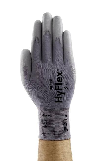 A hand is wearing a grey HyFlex protective glove by Ansell, model 48-102, size 9, with protective symbols and CE marking.