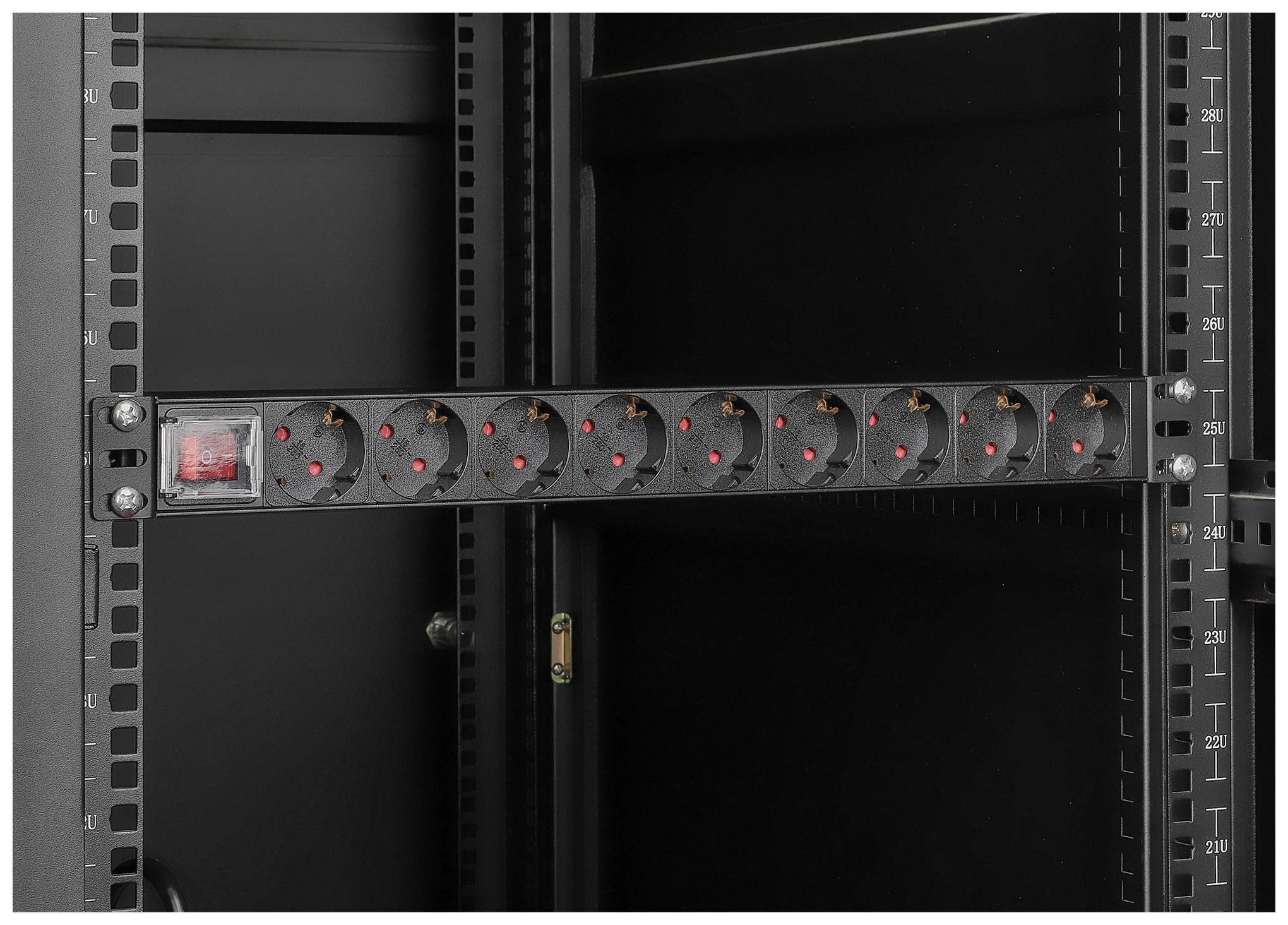 A black eight-socket power strip is horizontally mounted in an open, black server cabinet.