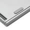 A silver, modern laptop hinge in close-up. A textured rubber pad is visible for stabilisation on a smooth surface.