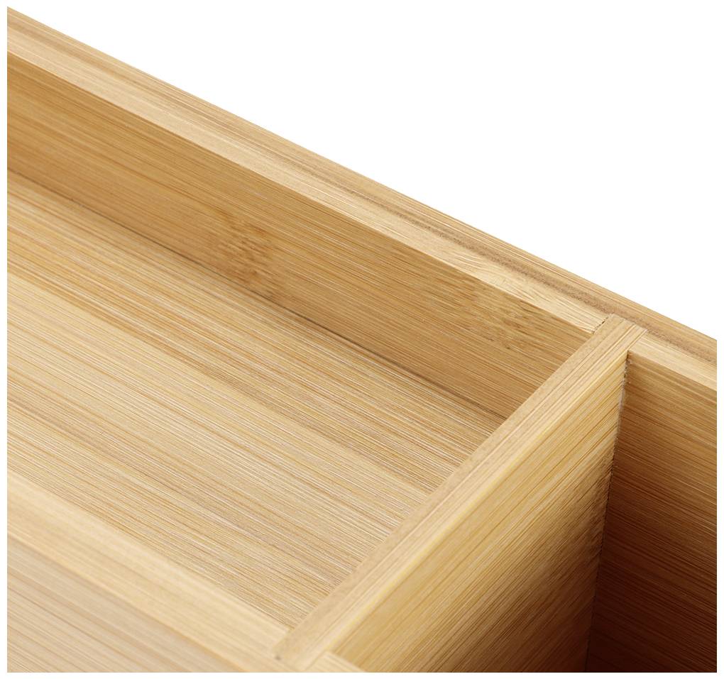 Wooden drawer made of light-coloured wood, open and empty, revealing an interior structure of smooth material. Suitable for storing small items.
