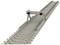 Rail screw pliers on a rail section, used for precisely tightening screws on railway tracks.