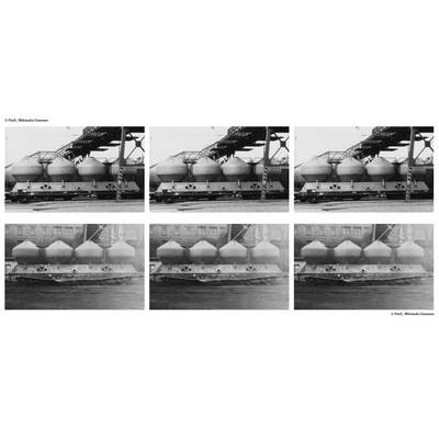 Six black and white photographs of silos at the harbour, three above and three below, show different contrasts and exposures.