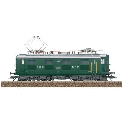 Green model electric train with 'SBB CFF' inscription on railway tracks. Two pantographs visible on the roof.