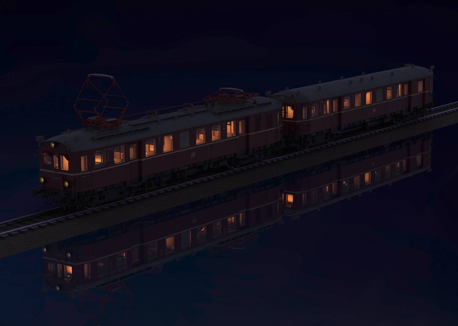 A train at night on tracks, illuminated with warm light from within. The dark surroundings reflect the train and enhance the atmosphere.