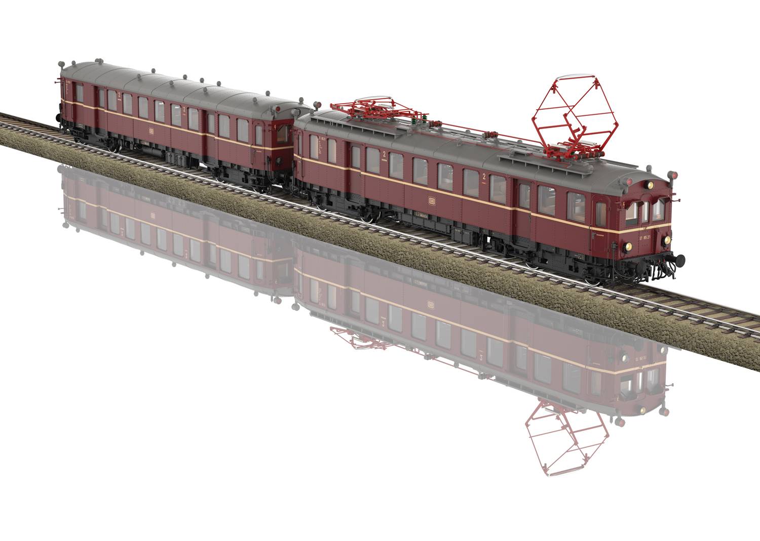 Train model in rust-red paintwork on track, consisting of two carriages with pantographs on the roof, reflecting on a smooth surface.