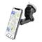 A smartphone displays a navigation map with a route, distance of 1.8 km and estimated time of arrival. It is mounted in a car holder.