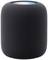 Black, cylindrical speaker with an illuminated upper rim displaying colourful lights.