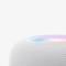 A white, spherical speaker with a colourful LED display on top.