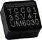 Black electronic capacitor with the marking 'TCC01 35V47 UM6030', showing technical specifications.