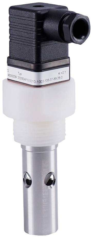 A sensor mounted in a pipe has a black electrical connection housing and a silver element with two holes.