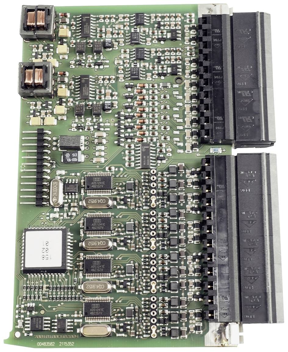 'Close-up of a circuit board with various electronic components and circuits, including chips and connectors.'
