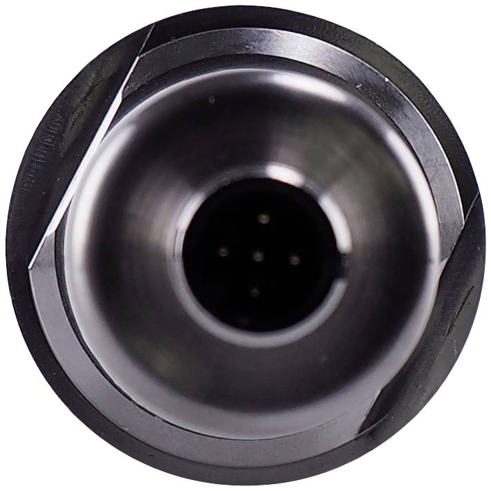 'Front view of a round, metallic connector with multiple contact pins in the centre.'