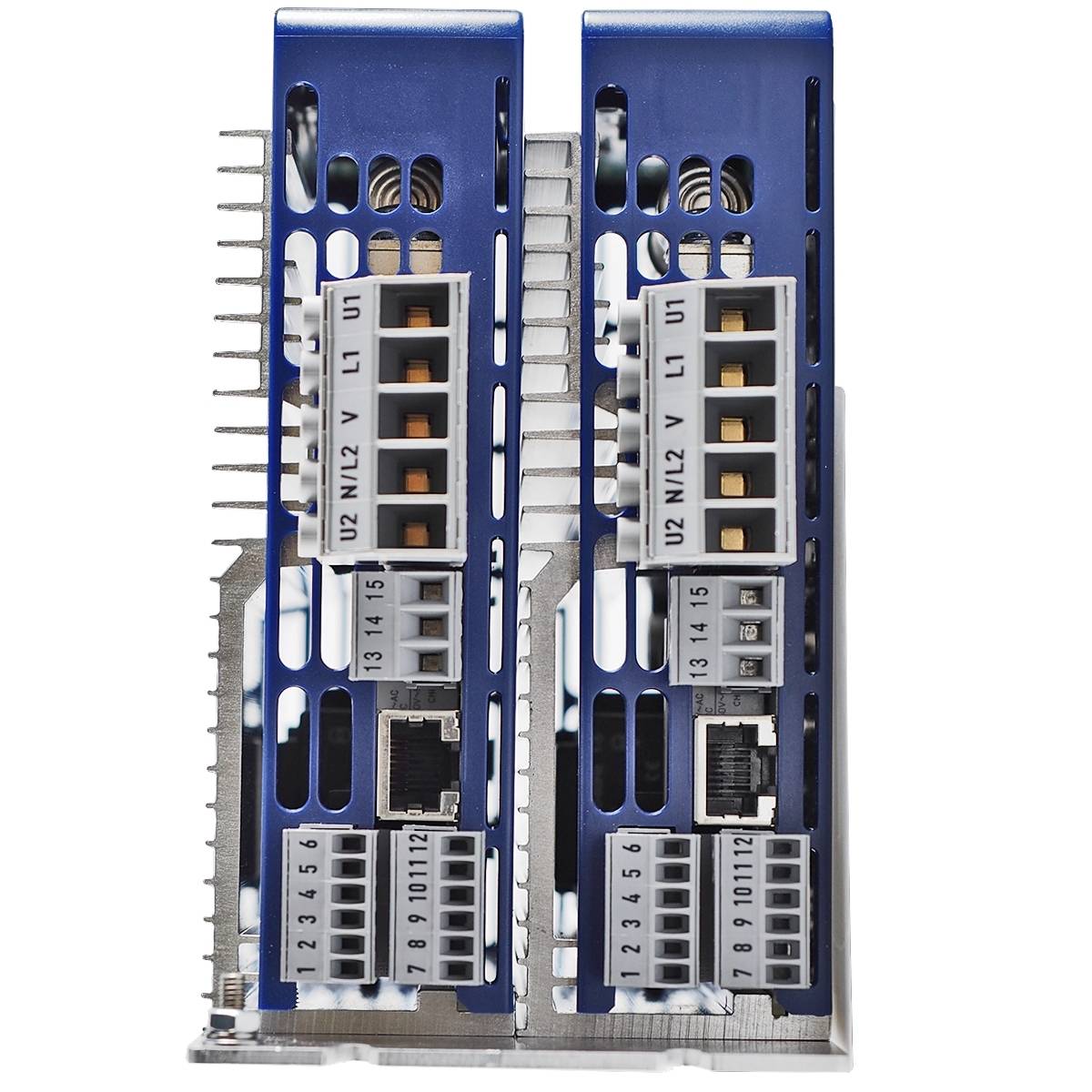 A partial electrical cabinet with blue heatsinks, two module rows with connections and labelled terminals for electrical connections.