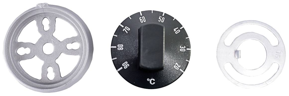 'Three metal parts: On the left and right, circular discs with openings, in the middle a black temperature rotary knob with degree markings.'