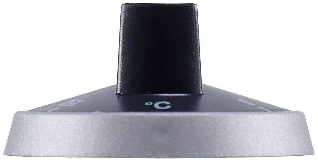 A black control knob on a metal plate indicates the Celsius scale. It controls the temperature of a device.