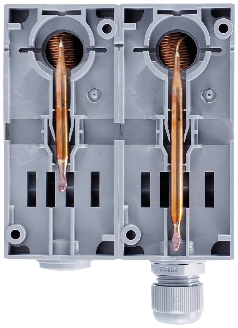 Two grey plastic casings with exposed, copper-coloured contact fingers inside. They are identical in construction and positioned side by side.