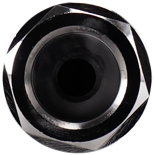 A black metallic hexagonal shape with a circular indentation in the centre, which looks like an opening.