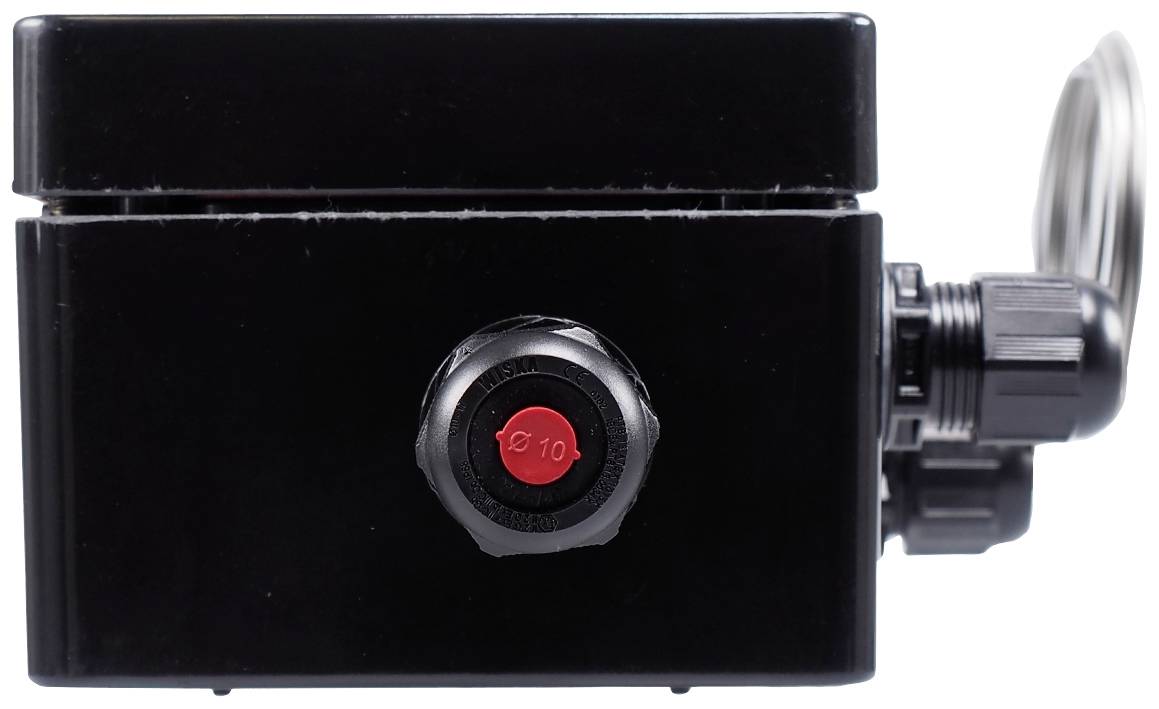 Black, rectangular technical device with a red rotary knob, cable connection on the right side.